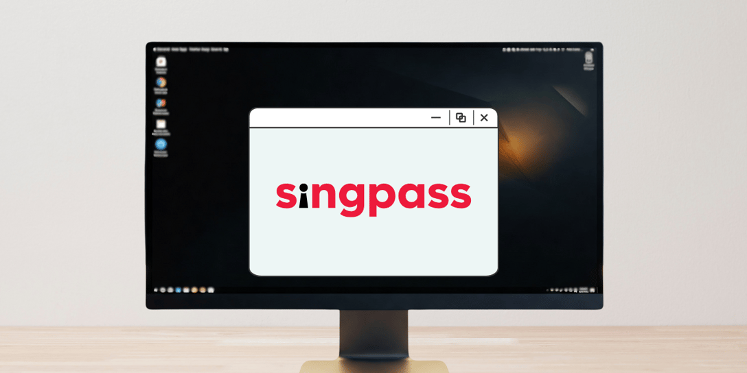 Desktop monitor shows a pop-up window with the Singpass logo