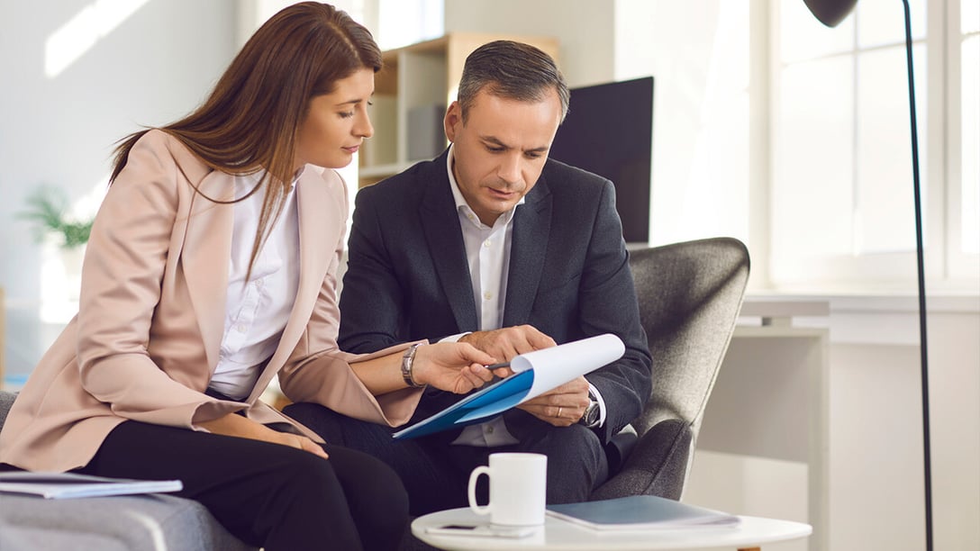 Two Business Professionals In A Discussion